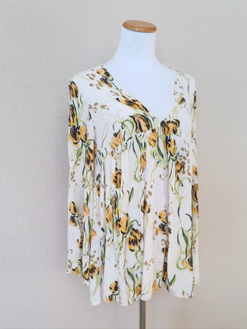 Free People lightweight peasant blouse with a flattering V-neck